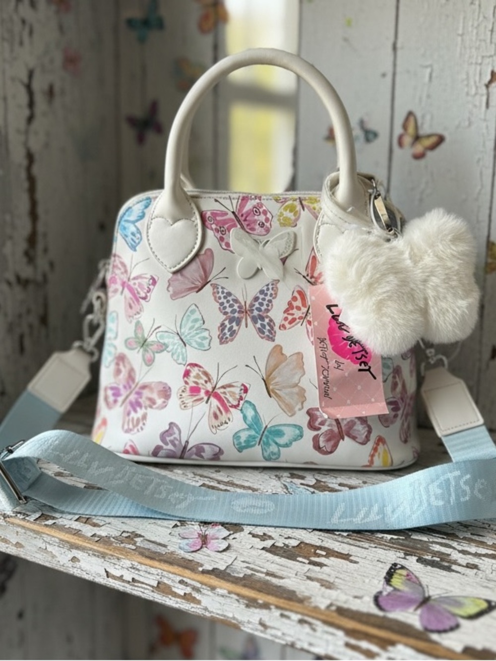 Betsey Johnson Dome Butterfly 🦋 Print Satchel Bag with Pastel Blue Strap
NWT